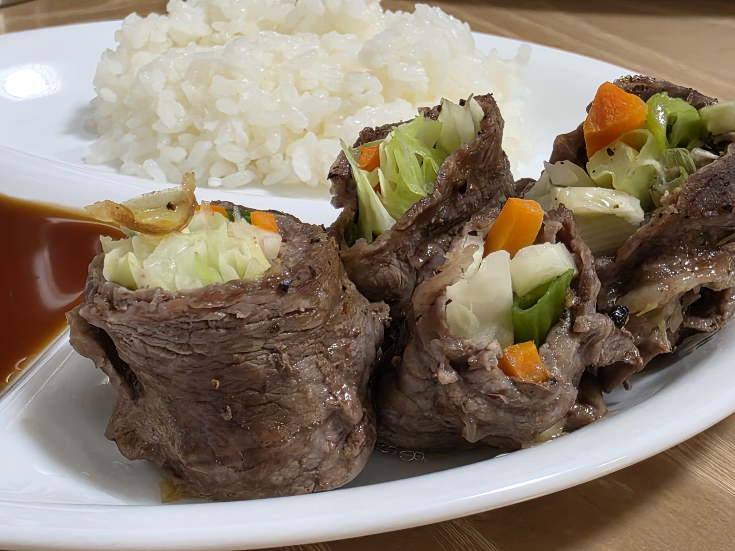 Steak rolls plated for dinner.