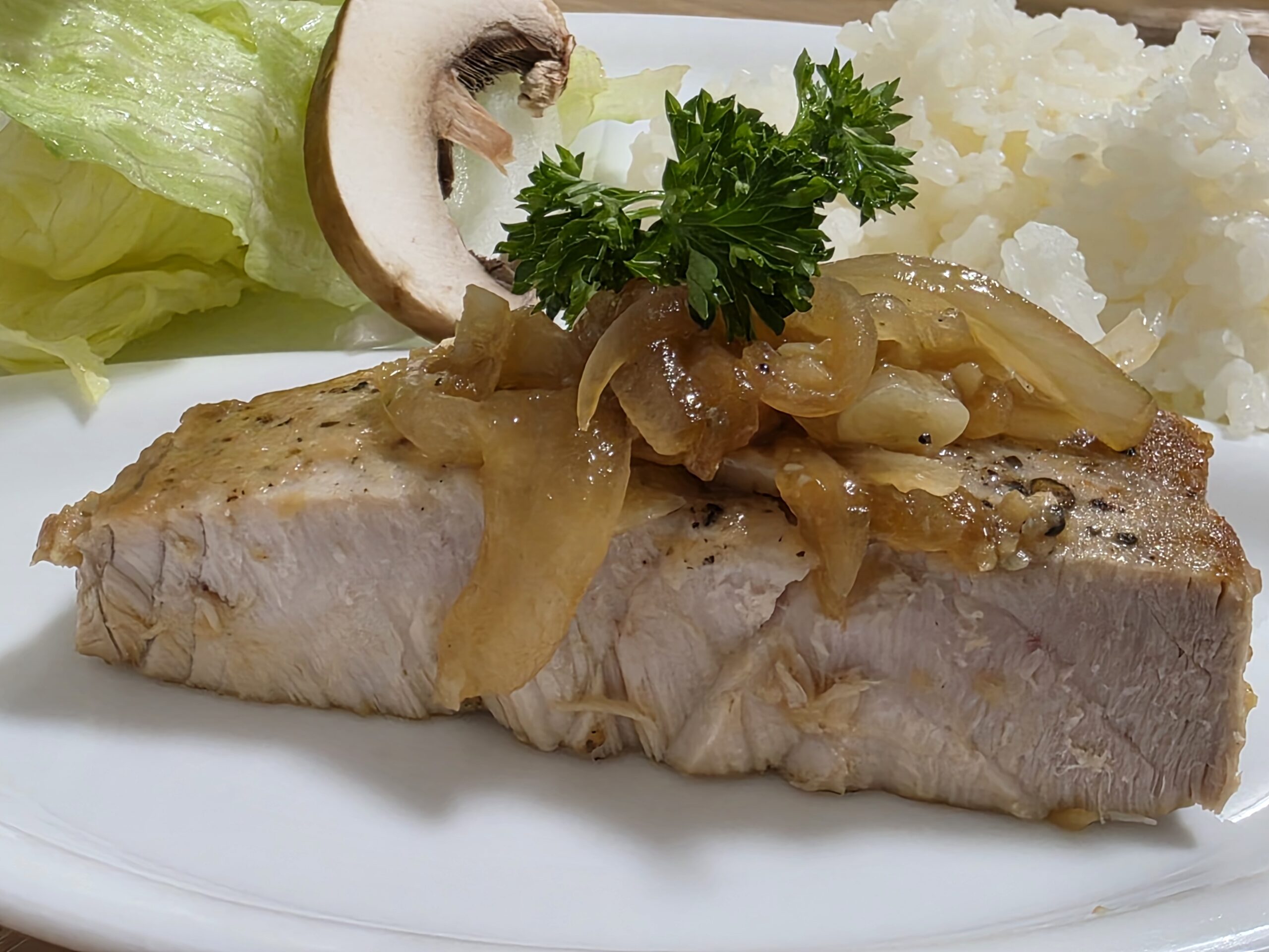 Single portion of fresh seared ahi served for dinner.