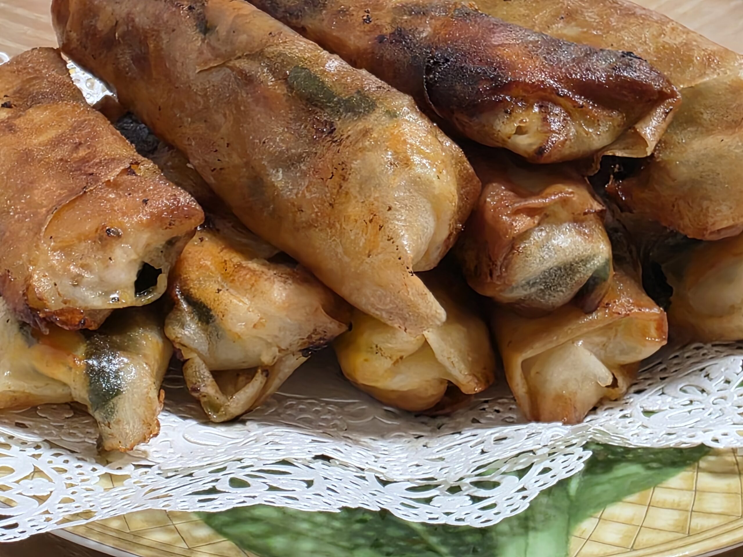Homemade spring rolls fried in olive oil.